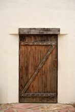 Old Wooden Door In Wall