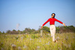 © AlivePhoto - Hipster Asian woman in red and sunglasses on white flower and grass field