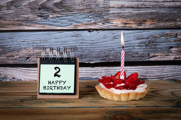 2 Happy Birthday. Cake with candle and greeting card