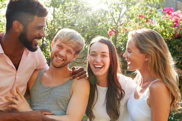 Wall Mural - Male And Female Gay Friends At Home Having Party In Garden Together