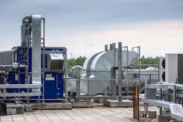 External infrastructure of the microclimate support system at a large industrial site. Air pipelines inlet and exhaust. Fans and air conditioning. Systems of control of pressure, humidity, temperature