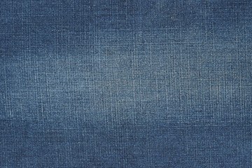 Wall Mural - Denim fabric texture. Faded jeans background. 