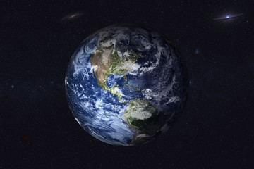 planet earth with night city lights in the space with far galaxy on the background. north and south 
