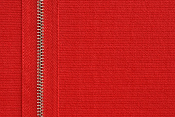 Wall Mural - Red jersey fabric texture background with metal decorative zipper . Copy space