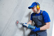 © Kadmy - boring hole for electric outlet by power tool drill.