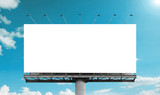 Fototapeta  - Mockup Large white blank billboard or white promotion poster displayed on the outdoor against the blue sky background. Promotion information for marketing announcements and details