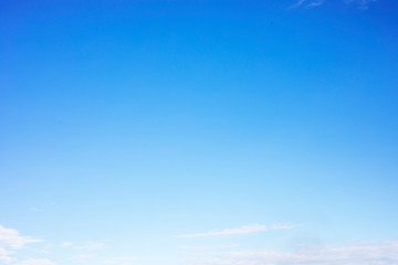 Wall Mural - fantastic soft white clouds against blue sky and copy space.