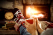 © magdal3na - Fireplace and slim woman legs with christmas socks