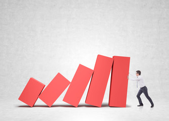 Poster - Businessman holding falling bar chart