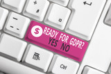 Fototapeta  - Writing note showing Ready For Gdpr Question Yes No. Business concept for Readiness General Data Protection Regulation White pc keyboard with note paper above the white background