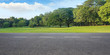 Empty highway asphalt road and beautiful sky in landscape green park
