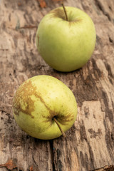 natural and healthy green apples on wooden table