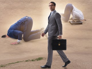 Wall Mural - The businessman hiding his head in sand escaping from problems