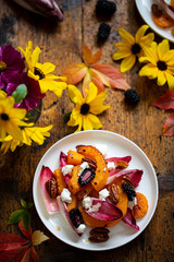 Wall Mural - Autumn salad with roast pumpkin, chickory, pecans and goat cheese