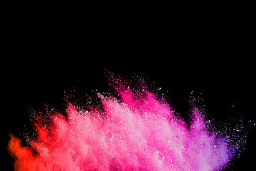 explosion of colored powder isolated on black background. abstract colored background. holi festival