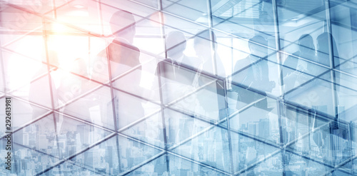 Photographie Double exposure image of faded business abstract background with office building and people conference group meeting showing partnership success of business deal