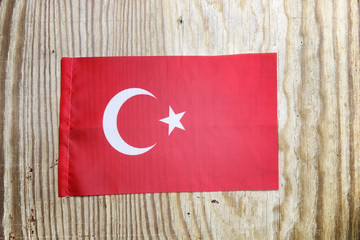 national textile flag on wooden table