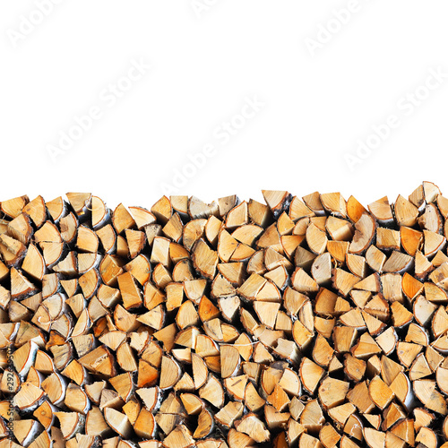 Cuadros en Lienzo Woodpile of birch firewood isolated on white background
