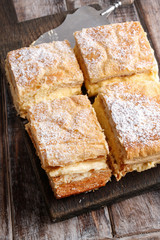 Poster - A Polish cream pie made of two layers of puff pastry, filled with whipped cream.