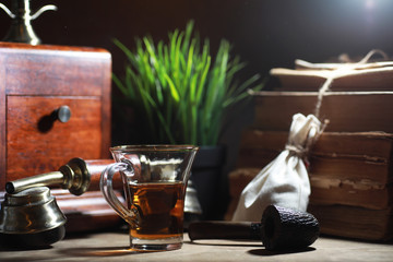 Wall Mural - Brewing tea on a wooden table