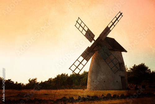 Cuadros en Lienzo Old windmill on the island Faroe, Sweden, on an early summer morning