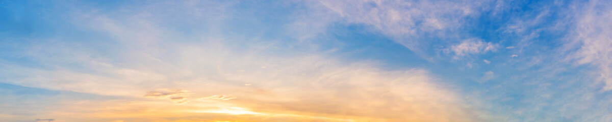 panorama of dramatic vibrant color with beautiful cloud of sunrise and sunset. panoramic image.