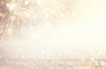 Wall Mural - new year abstract background holiday, gold and silver fireworks and bokeh, copy space.