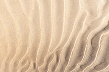 Sand Waves On The Beach