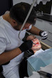 © ILIA - Dentist performs a dental examination of a pregnant patient
