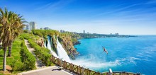 Aerial Panoramic Image Of Lower Duden Waterfall In Antalya, Turkey. Water Falls Drop Off Rocky Cliff Directly Into Mediterranean Sea In Sunny Summer Day.