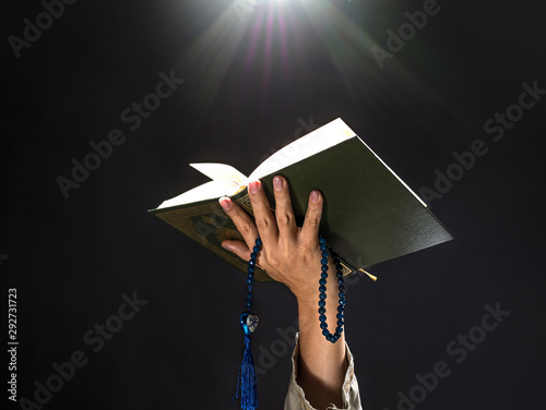 Fotografía Quran or Kuran ( the islamic holy book) on black