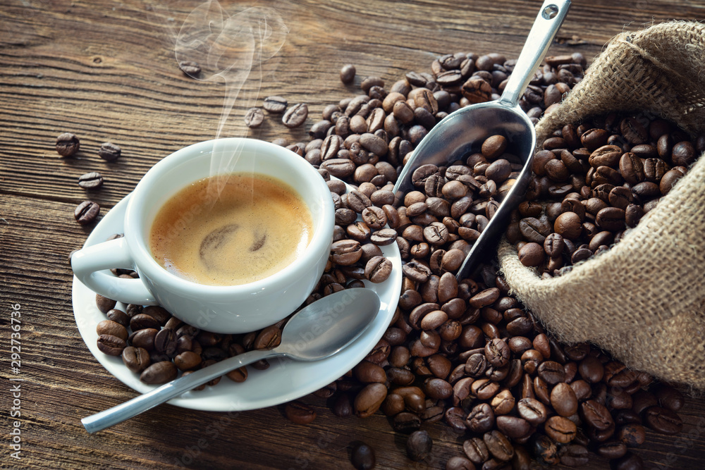 Cup of espresso with coffee beans - obrazy, fototapety, plakaty 