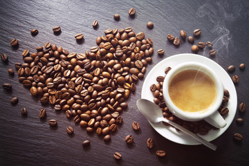 Wall Mural - Cup of espresso with coffee beans