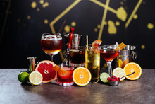 Exotic Tasty Alcoholic Cocktails On Dark Background