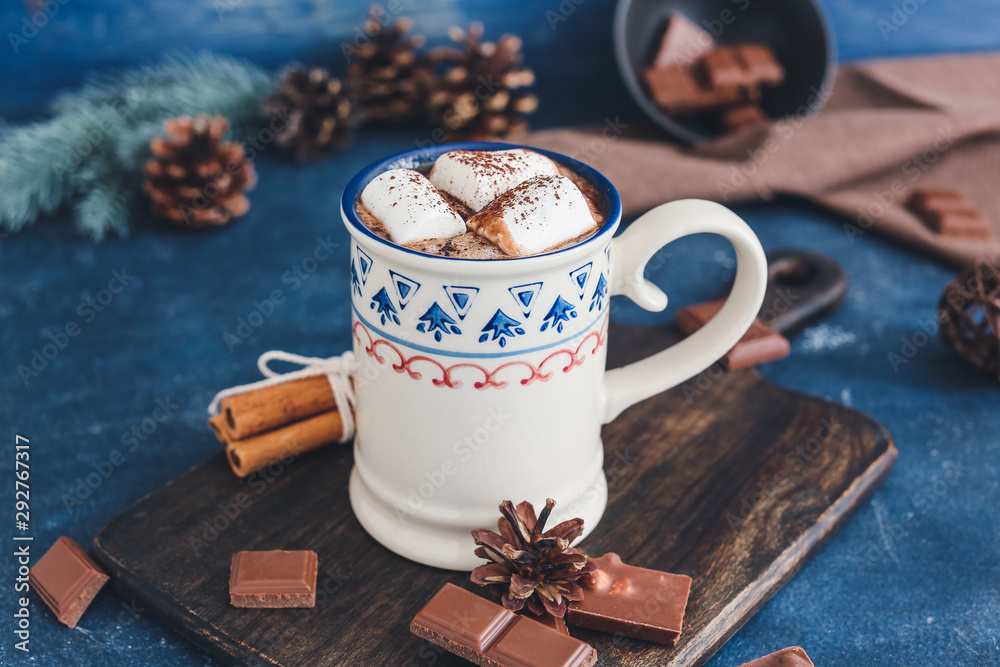 Cup of hot chocolate with marshmallows on table