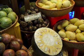 Thai traditional fruit market. Thai Asian tropical traditional fresh ripe fruit