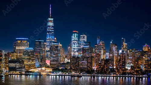 Fototapeta  Aerial view of Lower Manhattan skyline by in night in New York City