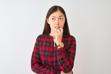 Sticker - Young chinese woman wearing casual jacket standing over isolated white background Thinking worried about a question, concerned and nervous with hand on chin