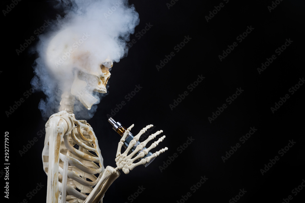 Skeleton vaping clouds of vapor with an ecigarette Stock Photo | Adobe Stock