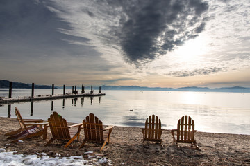 Wall Mural - Winter sunset on beach in lake tahoe