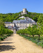 The tower of Chateau de La Roche-Guyon is perched atop the hill above the new chateau and garden