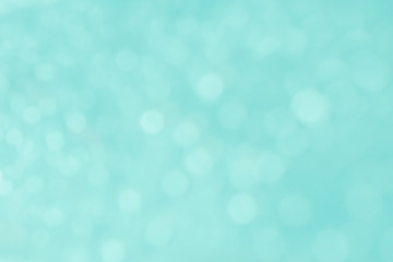 Wall Mural - Abstract blurred and bokeh of thinly droplets and reflection lighting on blue background.