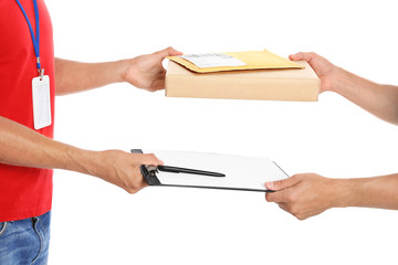 Poster - Courier giving parcel, envelope and clipboard to client on white background, closeup