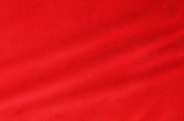 velvet texture background red color. Christmas festive baskground. Copy space.