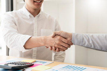 Wall Mural - businessman employee candidate shaking hands with company leader HR manager or boss in office after successful negotiation, recruitment  career and placement interview concept.