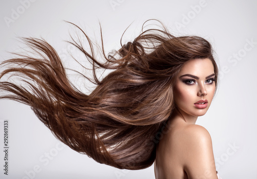 Cuadros en Lienzo Portrait of a beautiful woman with a long hair.