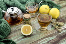 Useful Herbal Tea With A Plant (Sideritis Scardica) And Lemons Close-up