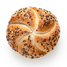 Traditional White Kaiser Roll With Linseeds And Sesame Seeds Isolated On White. Top View.