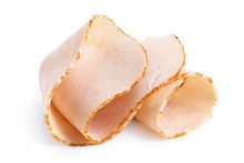 A Folded Single Slice Of Chicken Ham Isolated On White.
