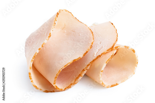 Fotomural A folded single slice of chicken ham isolated on white.